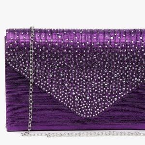 New never worn.  Purple clutch purse